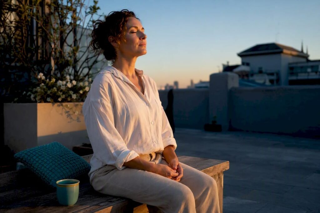 Person practicing calm breathing outdoors